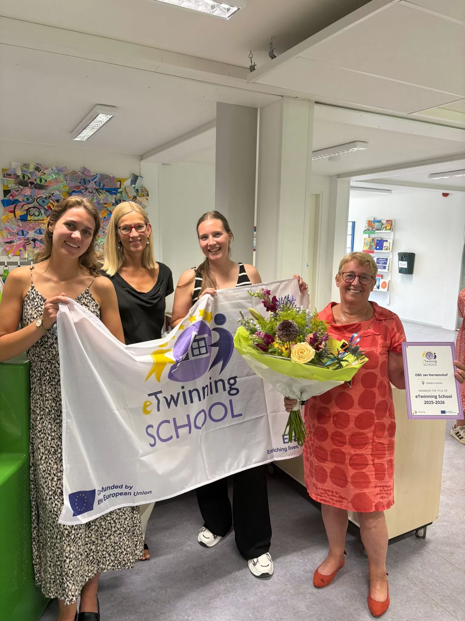 Ambassadeur Edith en collega's eTwinning School Label